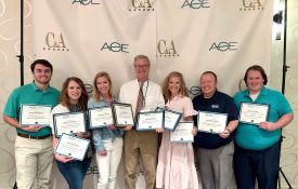Alabama Extension communications and marketing team members pictured with awards at the 2023 ACE conference.