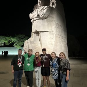 Alabama 4-H members posting in from of the Martin Luther King Jr. memorial in Washington D.C.