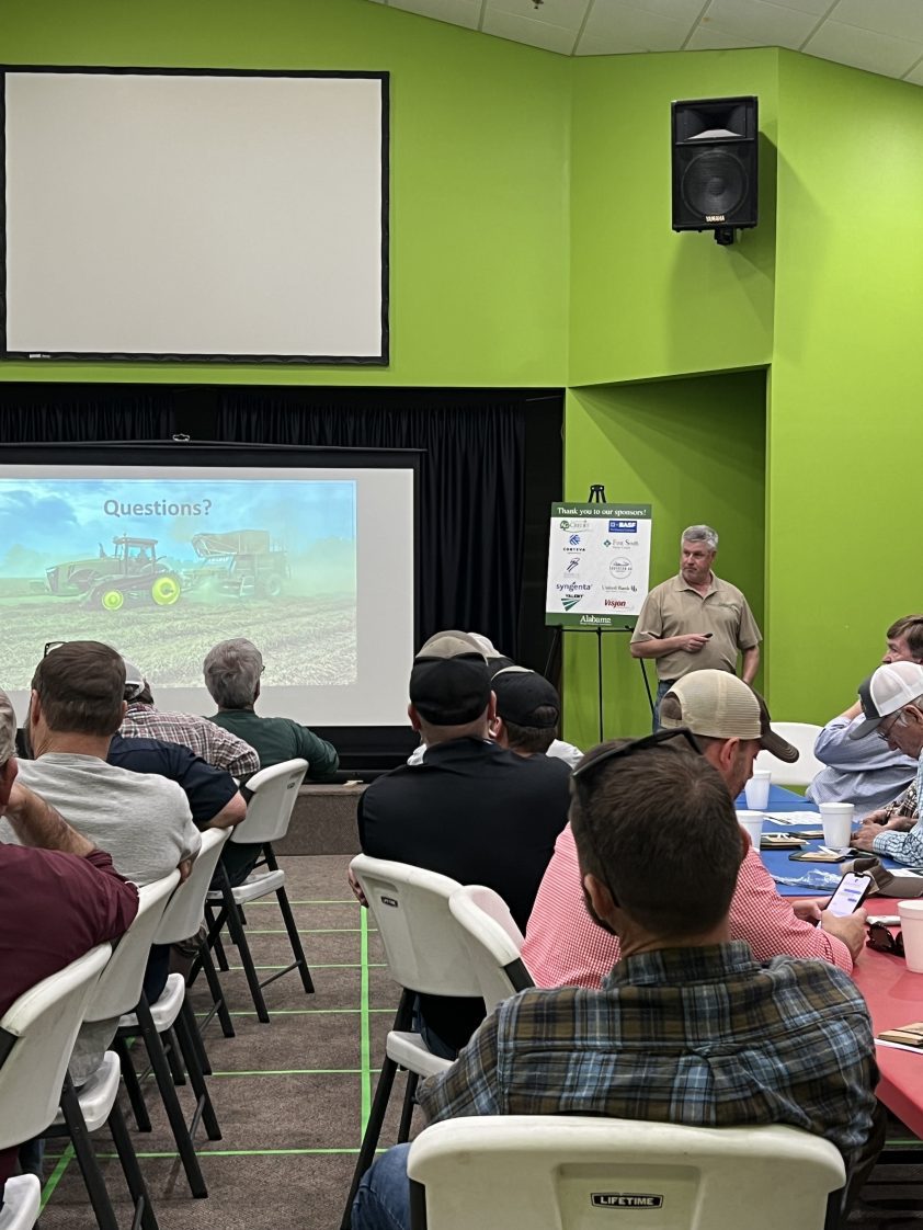 Figure 10. Kris Balkcom speaks to Alabama growers at peanut production meetings.