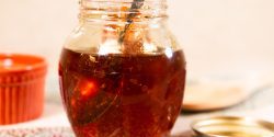 honey in a jar with a spoon