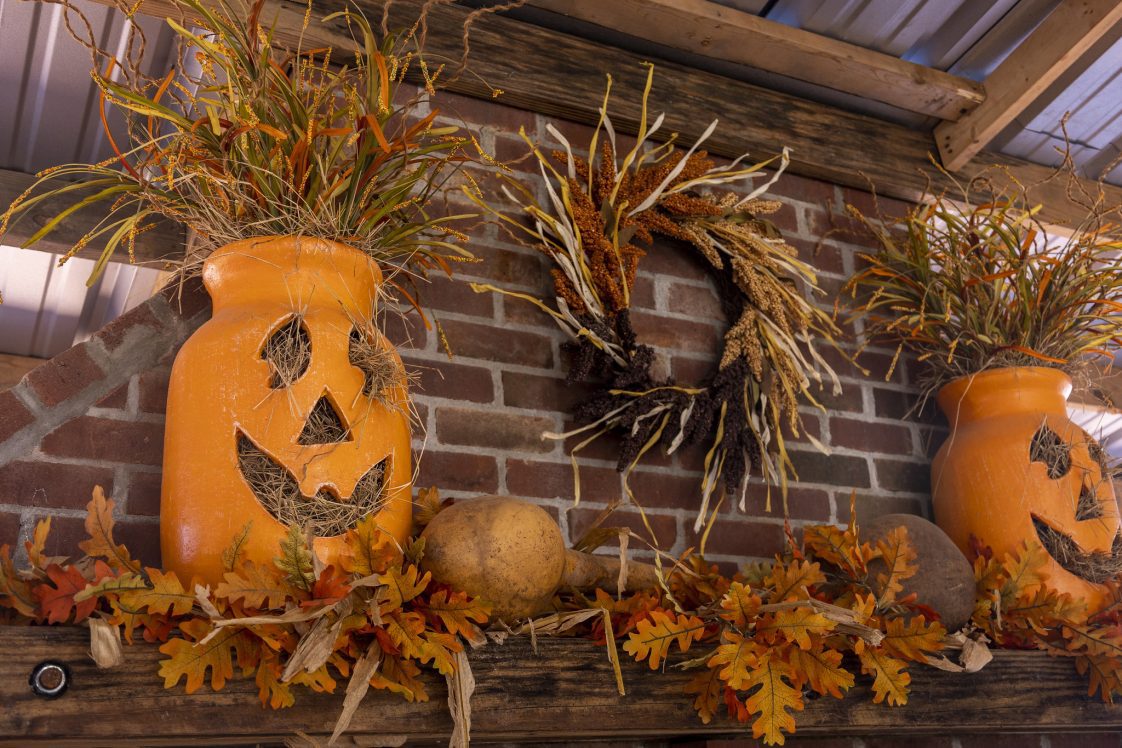 Halloween decoration on an outdoor mantel.