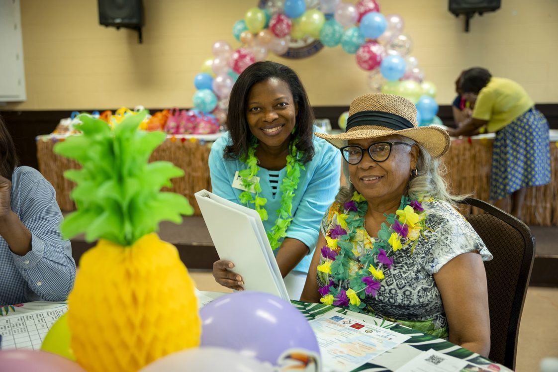 Janice Hall and Christine P. Boyd at the Macon County Celebrate and Educate Birthday Party for senior citizens.