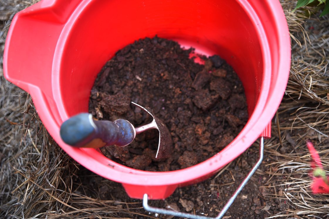 Figure 3. Mix individual cores or slices in bucket. Remove about 1 pint to use as a composite sample.