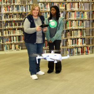 Alabama 4-H Tech Changemakers give a presentation at the Limestone Library