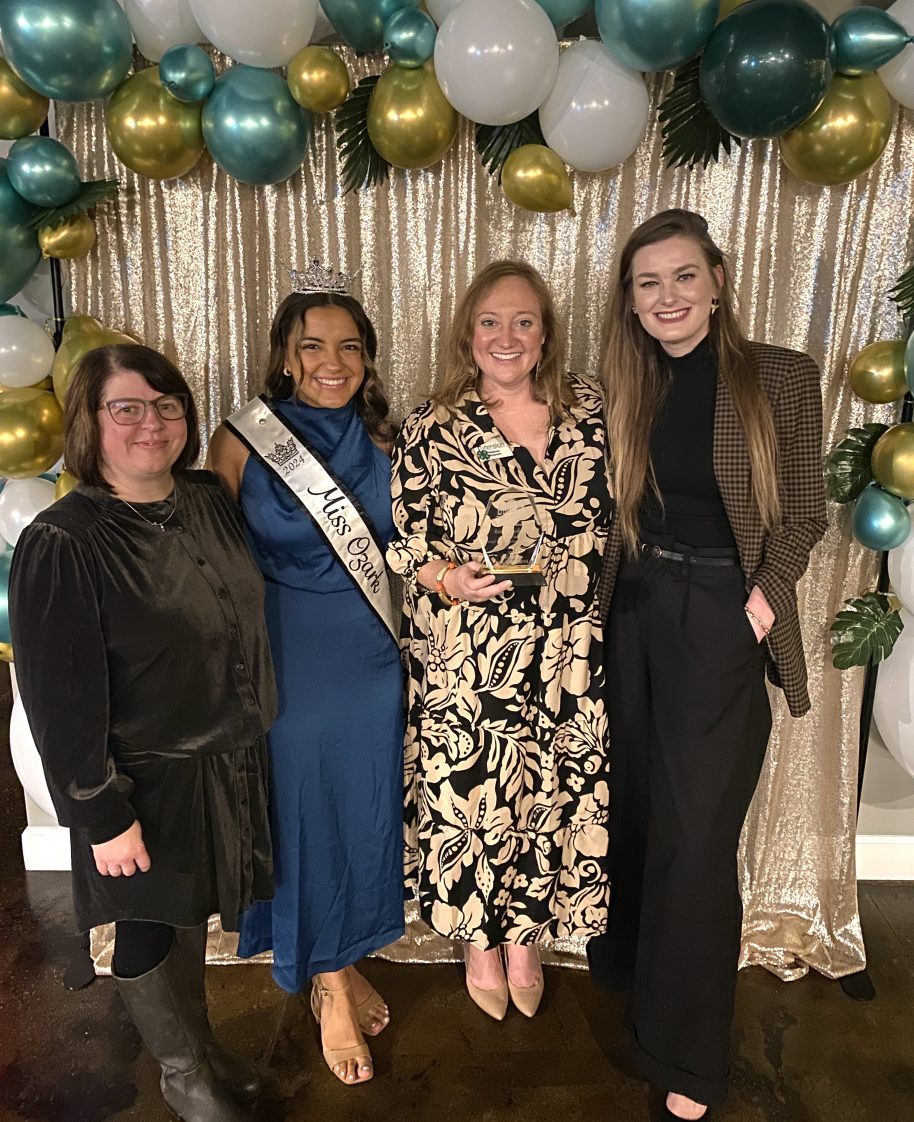 Voynich pictured with her team at the Ozark Business Excellence Awards