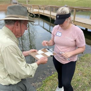 Volunteer monitors conduct bacteriological monitoring of a local lake.