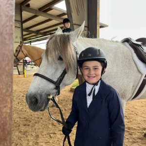 A 4-H member at the State Horse Show.