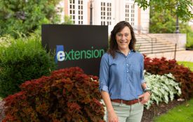 Eve Brantley standing in front of Duncan Hall.