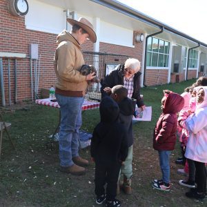 Kids learning about chickens