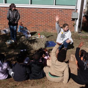 Kids learning about peanuts.