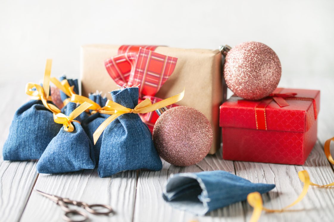 A group of holiday fabric and materials that were upcycled to create new items.