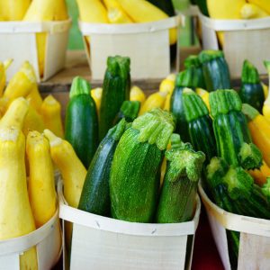 Yellow and green zucchini summer squash at the farmers market