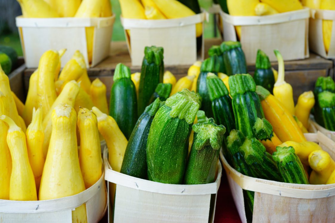 Yellow and green zucchini summer squash at the farmers market