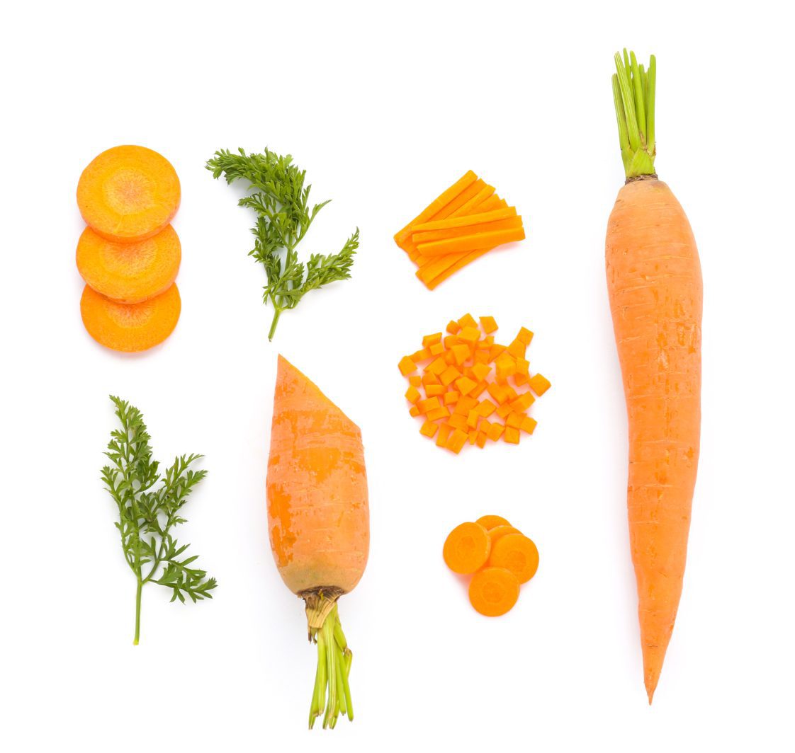 Tasty fresh carrots on white background