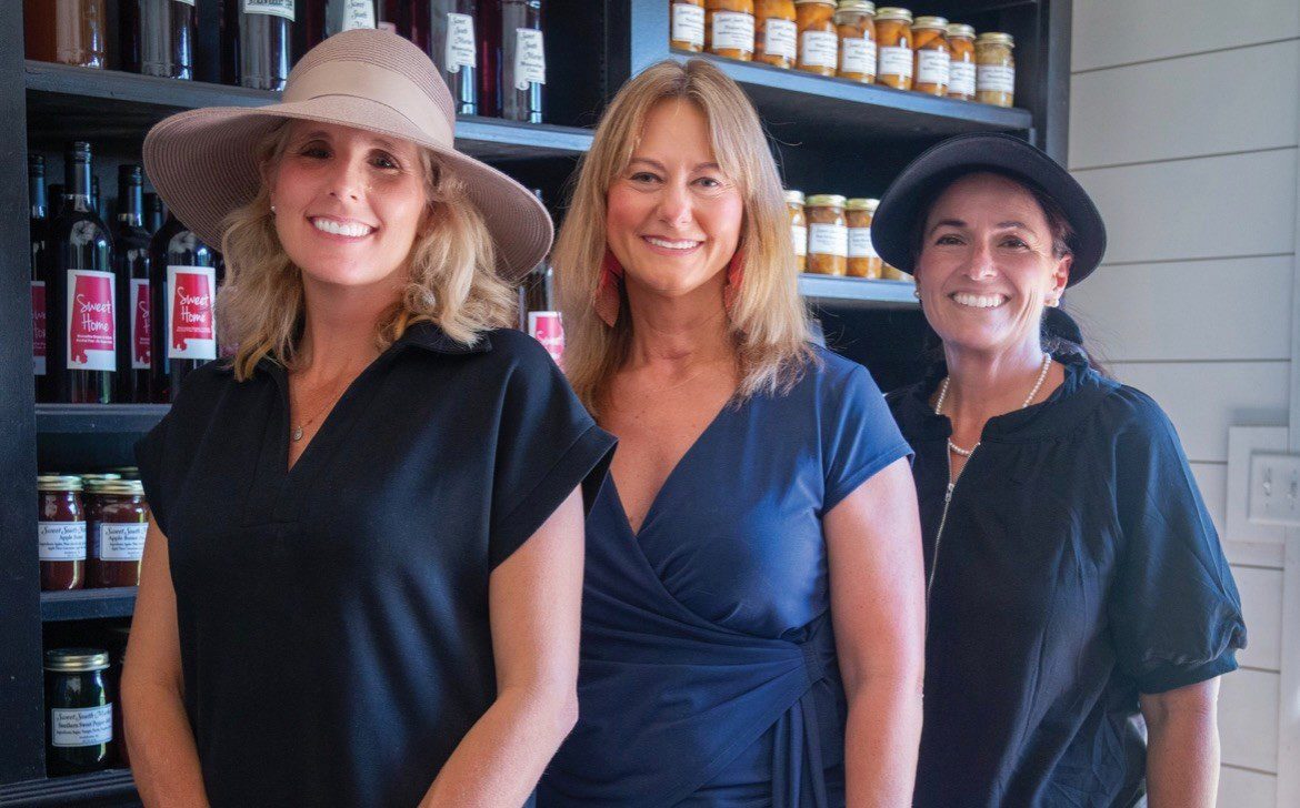 Figure 5. Bridgette Brannon (center) trained Rosemary Guilford (left) and Jennifer Bradley (right) in Cottage Foods and ServSafe as they launched and later expanded their Sweet South Market in Andalusia.