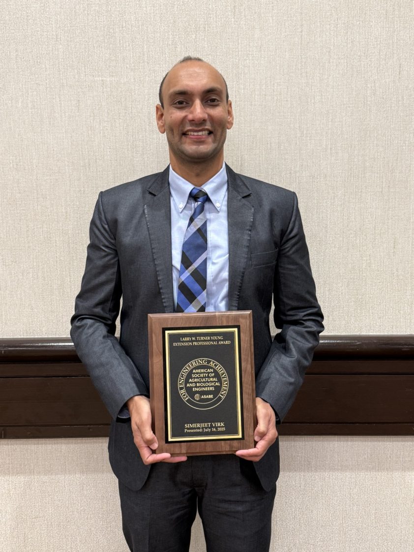 Simer Virk of Alabama Extension at Auburn University accepted the Young Extension Professional Award from the American Society of Agricultural and Biological Engineers during the group's annual international meeting in Toronto.