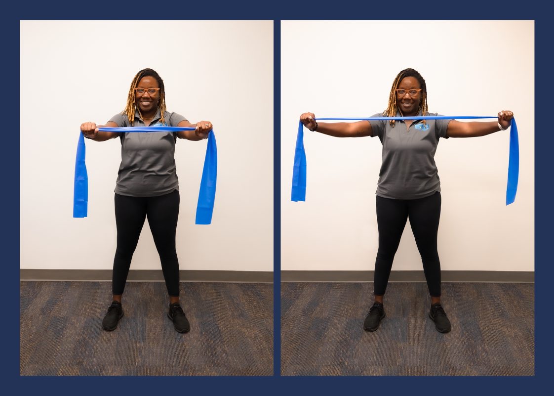 A woman demonstrating the pull apart resistance-band exercise.