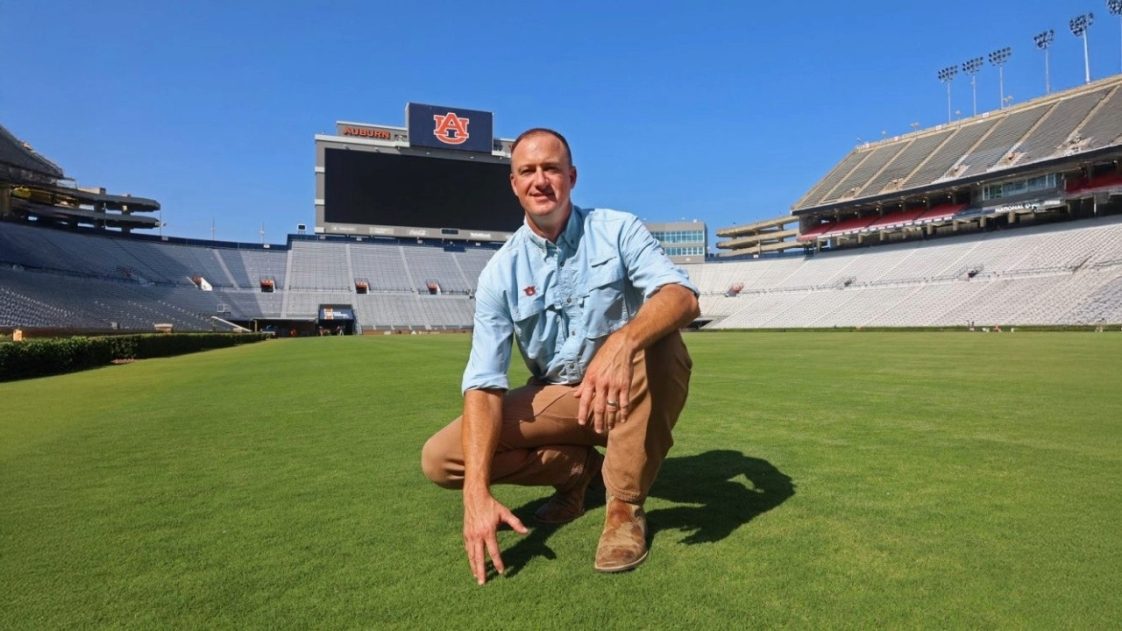 David Lawrence posed for a picture on Pat Dye Field.