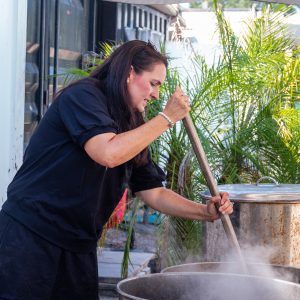 Jennifer Bradley of Sweet South Market stirs a pot of boiled peanuts.