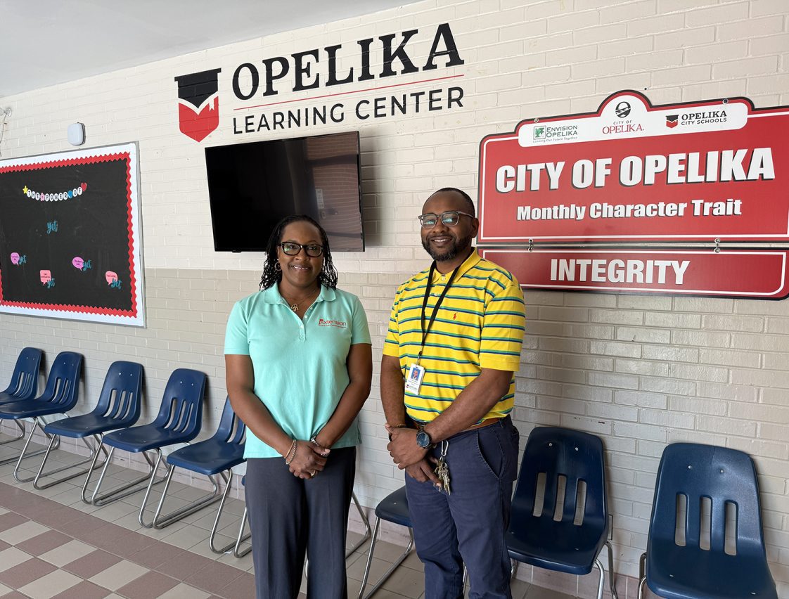 Regina Meadows and Tamarcus Milner posing for a picture at Opelika Learning Center.