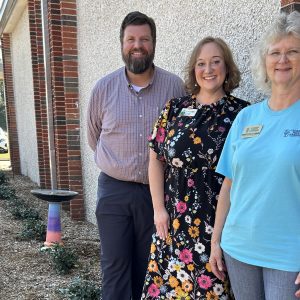 From left are Matthew Monson, Dale County Extension Director Melissa Voynich and Claybank Master Gardeners President Susan Rigsby. Now with the Ozark City School System, Monson was principal of D.A. Smith Middle School when the pollinator garden was completed.