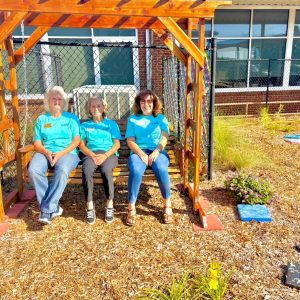 The Fall 2024 Claybank Master Gardeners intern class constructed a pollinator garden at D.A. Smith MIddle School in Ozark in Dale County. From left are Claybank Master Gardeners President Susan Rigsby and Claybank Master Gardeners Dorothy Bechtold and Maleia Lafluer. Bechtold and Lafleur were members of the fall 2024 intern class.