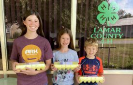 Elizabeth, Alaina and Jesse Knight before they dropped off their entries for the Golden Egg Contest.