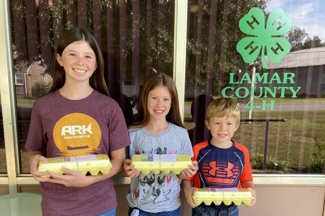 Elizabeth, Alaina and Jesse Knight before they dropped off their entries for the Golden Egg Contest.