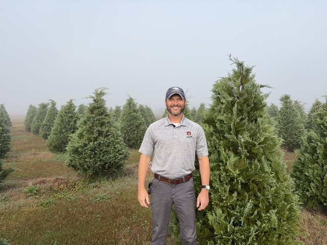 Jeremy Pickens of Alabama Extension with trees that were donated to Trees for Troops.