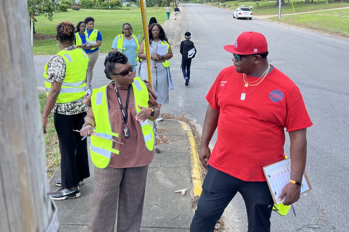 People participate in a Walkability Study in downtown Linden.
