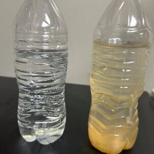 Figure 11. The same water sample as above, re-agitated and treated with alum; picture taken 1 hour and 30 minutes after treatment.