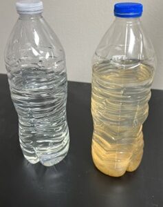 Figure 12. The same water sample as above, re-agitated and treated with alum; picture taken 3 hours after treatment.