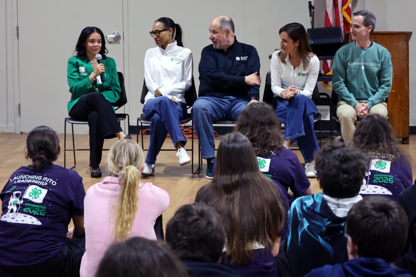 During a February visit, members of National 4-H Council addressed attendees during the Alabama 4-H Midwinter Teen Leadership Retreat. From left are Alabama 4-H State Ambassador President Aaliyah Sanders; National 4-H Council members Vice President of Communications Natalie Godwin, Chief Strategy Officer Andy Ferrin and President and CEO Jill Bramble; and Assistant Director for Alabama 4-H Casey Mull.