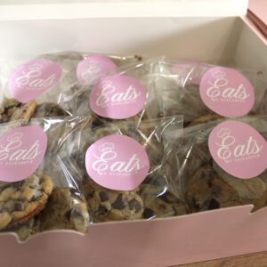 A box of individually wrapped chocolate chip cookies with Eats by Elizabeth stickers.