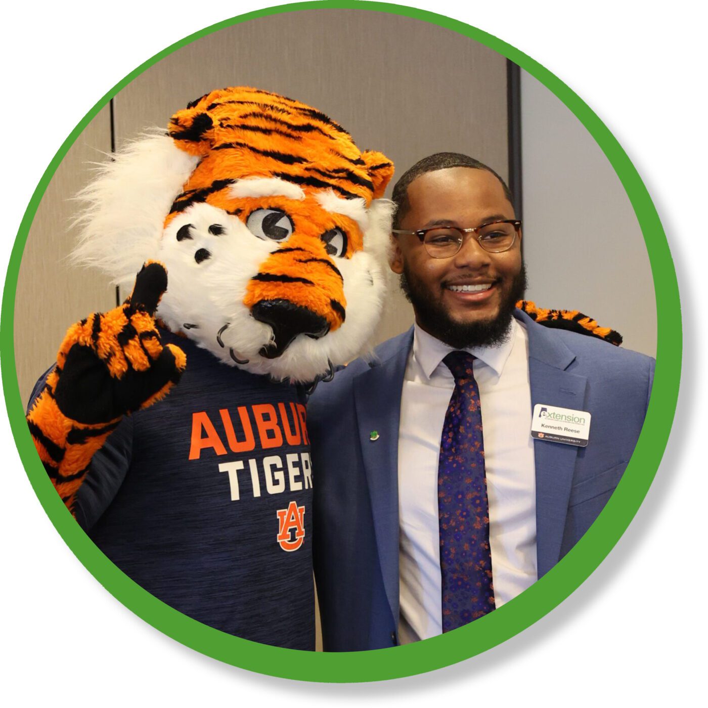 Kenneth Reese, 4-H agent in Jefferson County, and Aubie the Tiger