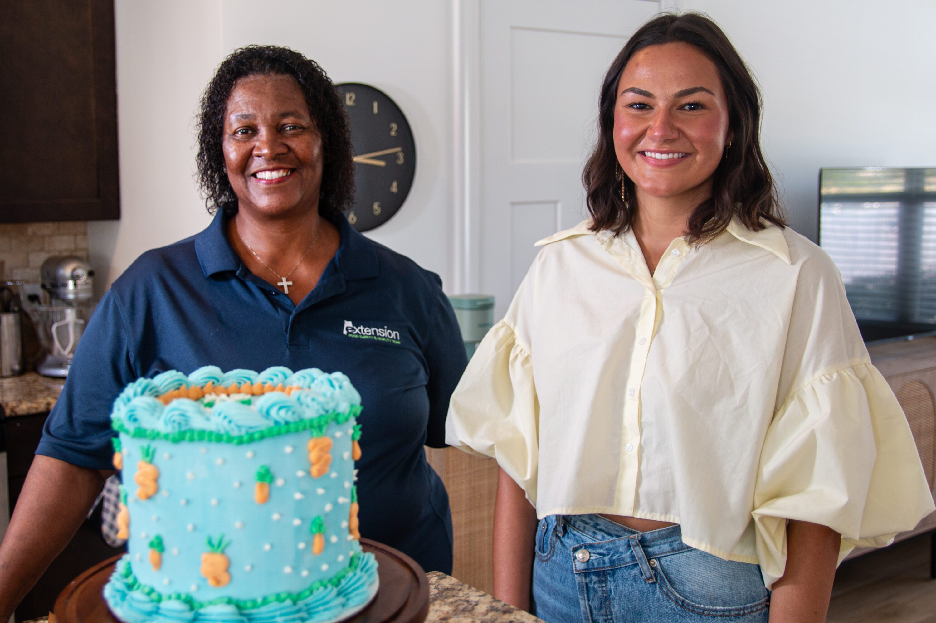 Auburn University sophomore Elizabeth Belcher, right, started Eats by Elizabeth after receiving her cottage food law certification. Alabama Extension Food Safety & Quality Agent Janet Johnson, left, taught the course that led to Belcher receiving her certification.