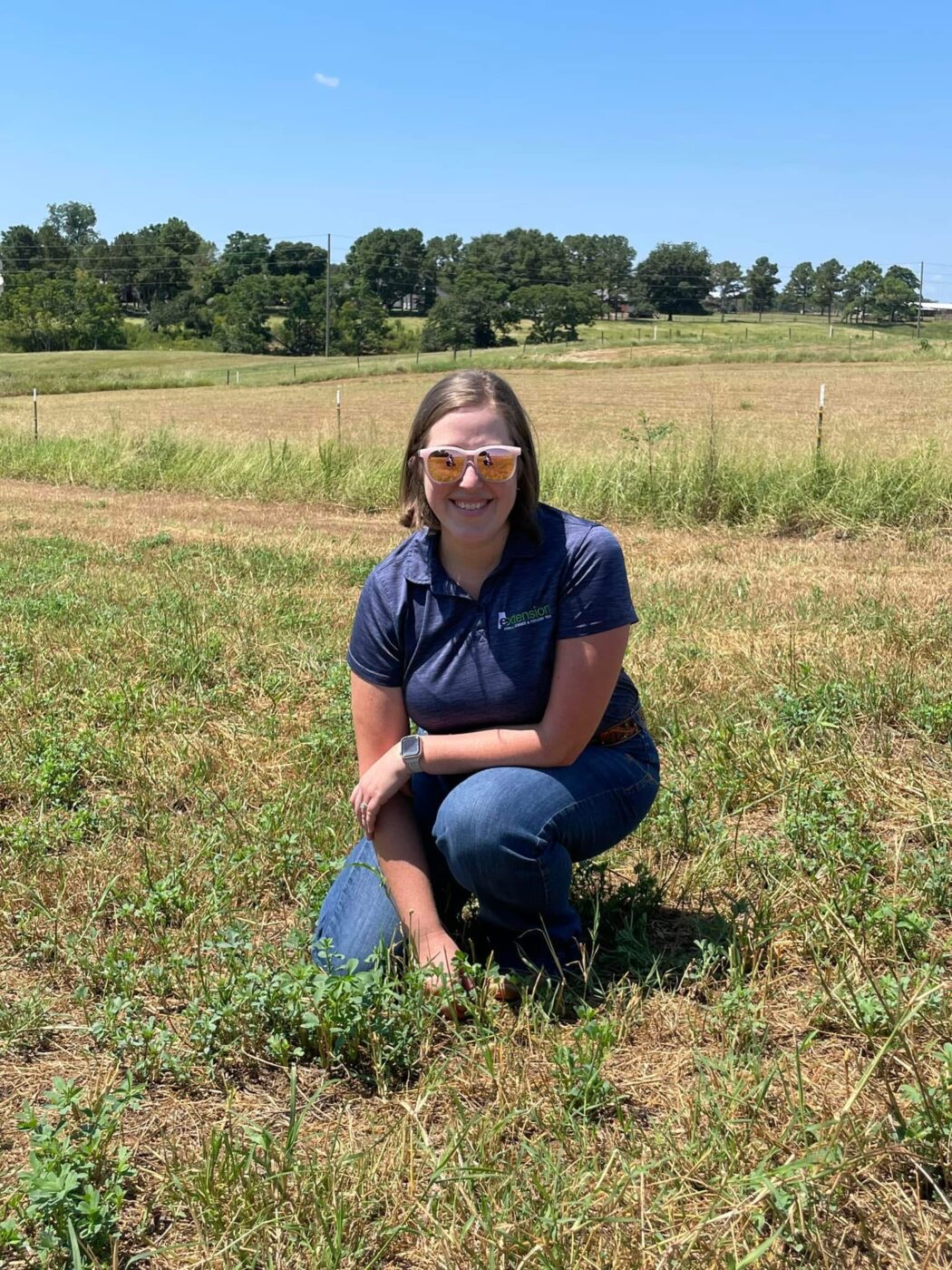 Kim Mullenix, head of Auburn University Department of Animal Sciences, posing for the picture in a field.