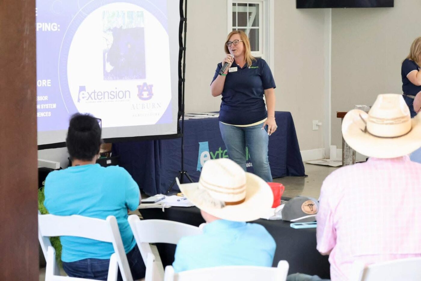 Court Green-Johnson speaking to a group of farmers.