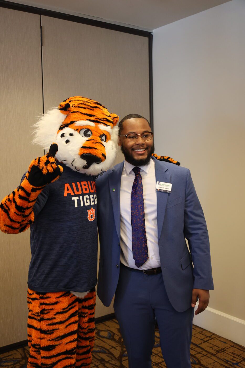 Kenneth Reese, 4-H agent in Jefferson County, and Aubie the Tiger
