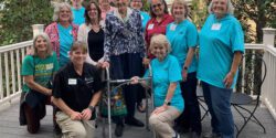 Members of North Alabama Master Gardeners surround Mary Lou McNabb.