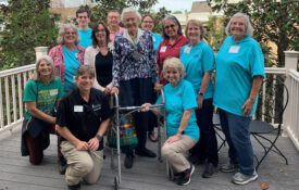 Members of North Alabama Master Gardeners surround Mary Lou McNabb.