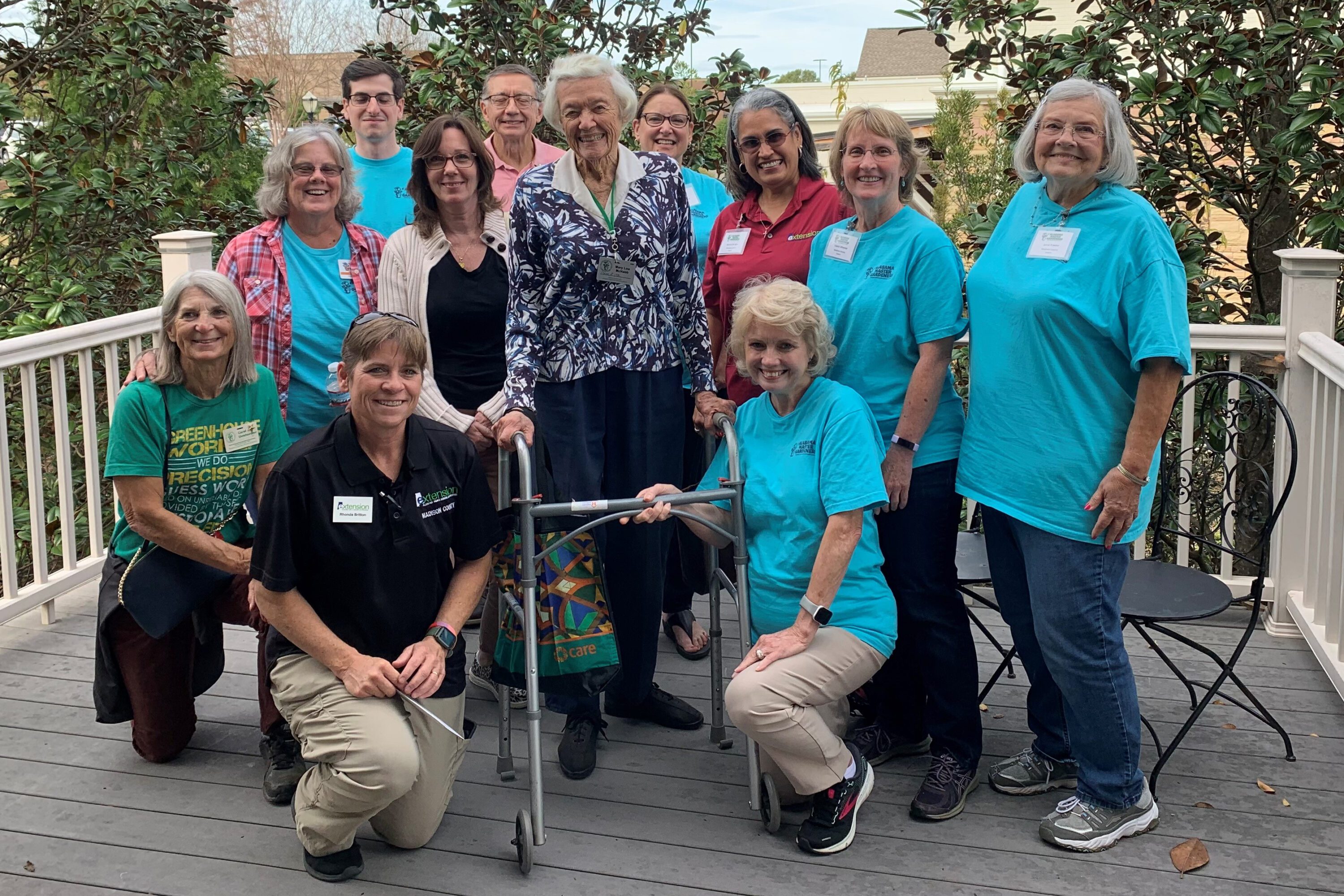 Members of North Alabama Master Gardeners surround Mary Lou McNabb.