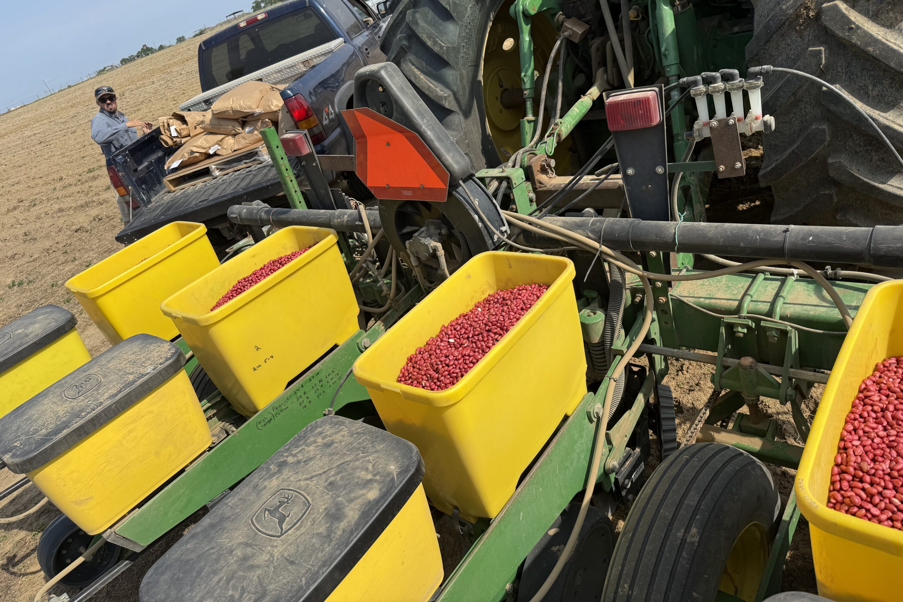 A peanut planter ready to plant in a field.