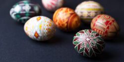 Pysanka Easter eggs on a black background.