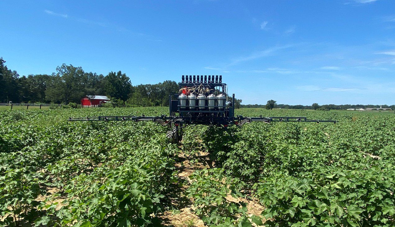 Figure 2. Spraying a field for on-farm cotton jassid trial in southeast Alabama