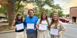 Kacey Watson, Justin Miller, Laney Jones and Ashlee Hall posing with Alabama Extension's 2026 ACE awards.