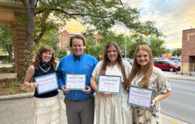 Kacey Watson, Justin Miller, Laney Jones and Ashlee Hall posing with Alabama Extension's 2026 ACE awards.