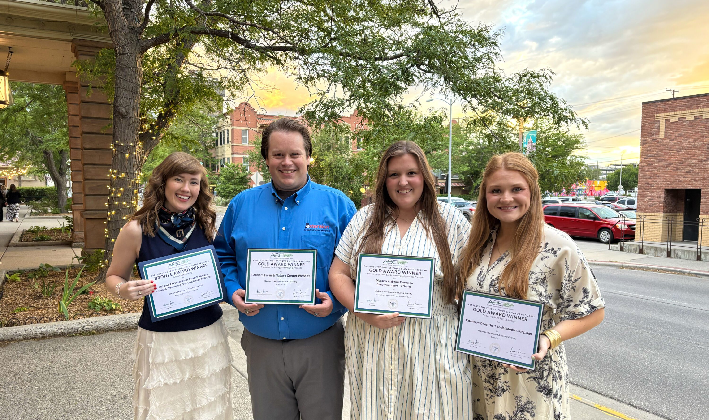 Kacey Watson, Justin Miller, Laney Jones and Ashlee Hall posing with Alabama Extension's 2026 ACE awards.
