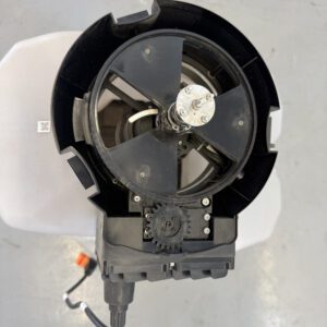 A gravity-fed metering gate system available on commercial drones for metering dry materials, including cover crop seed.