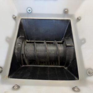 An auger-type system available on commercial drones for metering dry materials, including cover crop seed.